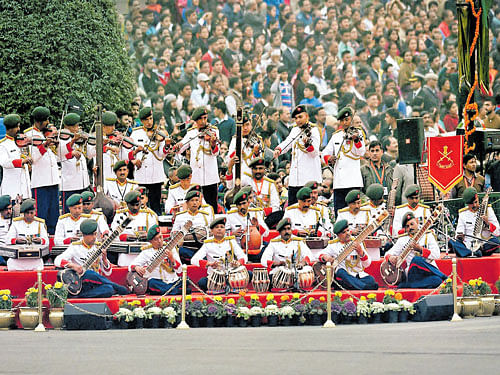 The Army band  performs during the Beating the Retreat ceremony at Vijay Chowk in New Delhi on Friday. PTI