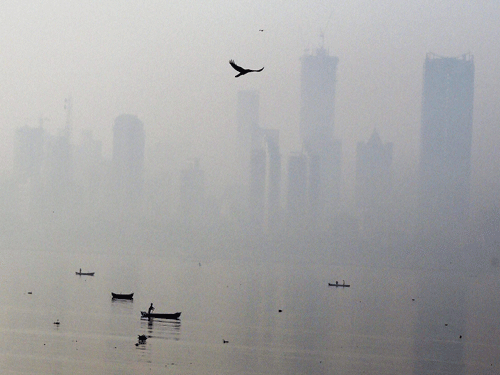 Thick smog in Mumbai on Friday morning. PTI Photo.