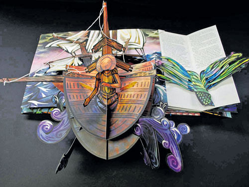 wow! Pop-up book by Robert Sabuda (left) is one among the trove of artistic books.