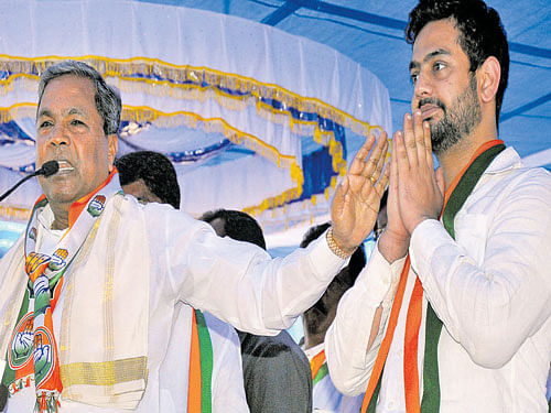show of support: Chief Minister Siddaramaiah campaigns for C&#8200;K&#8200;Rahman Sharief,  Congress candidate for the byelection to the Hebbal Assembly seat, at a public meeting at  V Nagenahalli in the City on Sunday. DH PHOTO