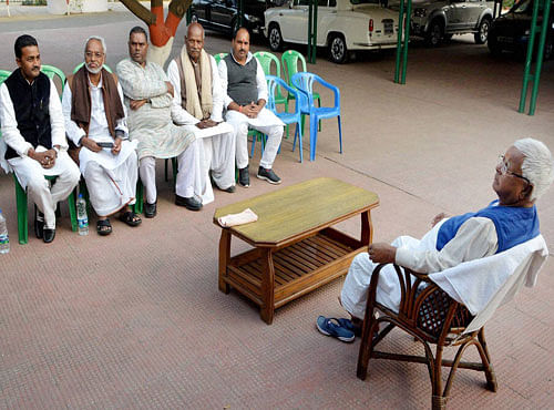RJD chief Lalu Prasad interacting with Madhesi activists from Nepal in Patna on Monday. PTI Photo