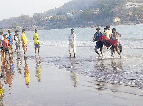 Fourteen students from Pune's Maharashtra Cosmopolitan Education Society's Abeda Inamdar Senior College of Arts, Science and Commerce, drowned off the Murud beach in Raigad district on Monday. PTI photo