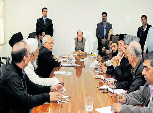 Muslim clerics and social leaders meet the Union Home Minister Rajnath Singh, in New Delhi on Tuesday. PTI