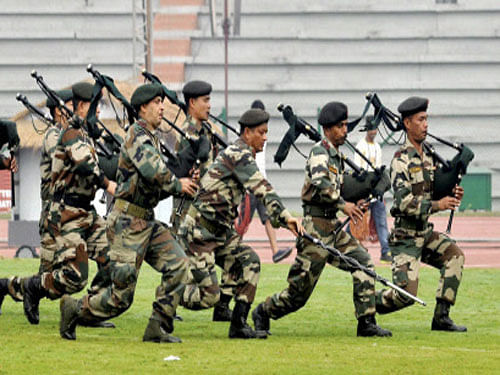 Assam Rifles jawans rehearse for the opening ceremony of the 12th South Asian Games at Indira Gandhi Athletic stadium in Guwahati on Wednesday. PTI Photo