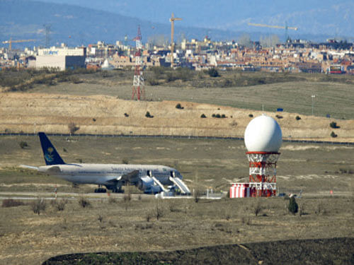 Saudi Arabian Airlines flight SVA 226 is isolated on the tarmac after its passengers and crew were evacuated following a bomb threat, at the Barajas airport in Madrid, Spain. Reuters photo