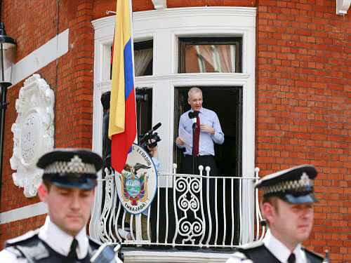 WikiLeaks founder Julian Assange speaks to the media outside the Ecuador embassy in west London. Assange was granted political asylum by the Ecuador government in 2012. In 2014, he complained to the UN that he was being 'arbitrarily detained' as he could not leave without being arrested. Reuters file photo