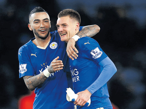THE ACE UPFRONT: Leicester City's Jamie Vardy (right) celebrates with Danny Simpson after firing another goal in what has been a superlative season. REUTERS
