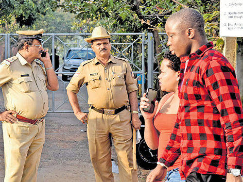 Policemen on patrol at Soldevanahalli in the City on  Saturday. dh photo