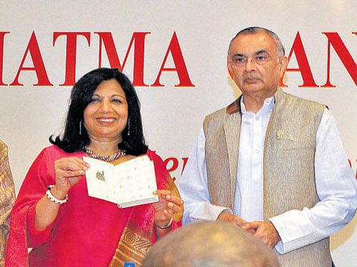Chairman and Managing Director of Biocon Limited Kiran Mazumdar Shaw releases the book on 'Mahatma Gandhi - Eternal Inspiration' at a programme in the City on Sunday. Rajmohan Gandhi, grandson of Mahatma Gandhi are also seen. DH PHOTO