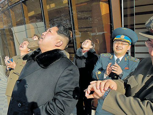 North Korean leader Kim Jong Un watches a long-range  rocket launch in North Korea on Sunday. REUTERS