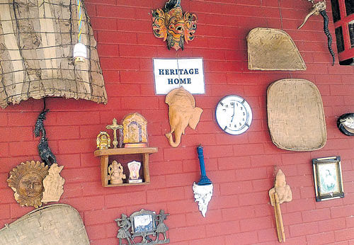 A wall adorned with artefacts in John's home. Photos by author