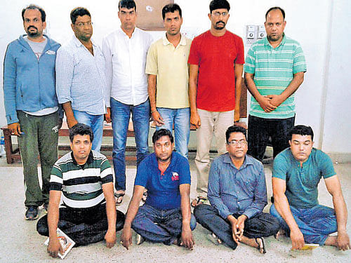 Ten members of the syndicate who were arrested by the Bengaluru Police. DH PHOTO