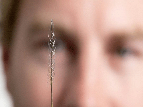 The new device is the size of a small paperclip and will be implanted in the first in-human trial at The Royal Melbourne Hospital in 2017. Image courtesy Twitter.