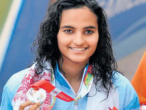India's Damini Gowda with her gold in the 200 M butterfly. PTI