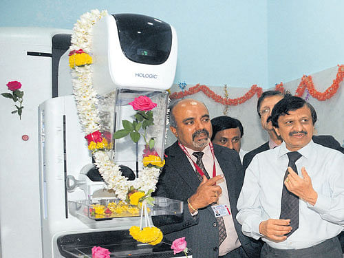 Dr C N Manjunath, Director, Sri Jayadeva Institute of  Cardiology and Dr K B Lingegowda, Director, Kidwai  Memorial Institute of Oncology, at the inauguration of the digital mammography equipment at the Kidwai Hospital in the City on Tuesday. DH PHOTO
