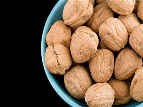 The study also showed that a diet containing walnuts, which are primarily comprised of polyunsaturated fats, positively impacts heart health markers, such as cholesterol. Reuters File Photo.