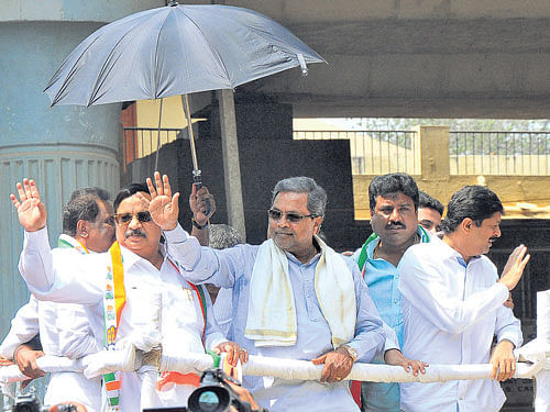 Chief Minister Siddaramaiah, Ministers R Roshan Baig and K J George canvass for the Congress. DH&#8200;Photo