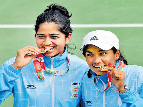 India's Prarthana Thombre (left) and Sharmada Balu after their triumph in the women's doubles. PTI