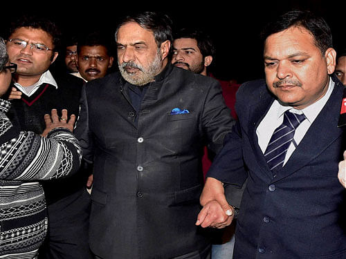 Congress leader Anand Sharma being taken away in security after ABVP students partialy prevented him from leaving the Jawaharlal Nehru University (JNU) in New Delhi on Saturday. Anand Sharma, Rahul Gandhi and many left leaders went to the campus to meet the students protesting for the release of Student Union president Kanhaiya Kumar. PTI Photo
