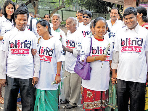 Visually impaired couples take part in a Valentine's Day programme orginsed by the IDL Foundation on Sunday. DH PHOTO