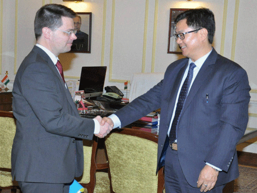 Minister of State for Home Kiren Rijiju with UK Minister of State for Immigration James Brokenshire in New Delhi. PTI Photo.