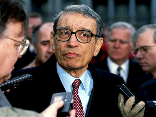 File picture of U.N. Secretary-General Boutros Boutros-Ghali surrounded by media as he leaves the White House. Reuters