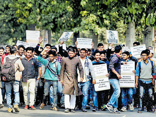 AMU students hold a protest rally over the JNU row, at Aligarh Muslim University in Aligarh on Tuesday. PTI