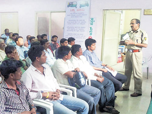 creating awareness Drunk-driving offenders attend a screening session at the Upparpet  police station. ACP&#8200;(traffic-west)&#8200;Jagadeesh G A&#8200;administers to offenders the oath not  to drive drunk. DH PHOTO