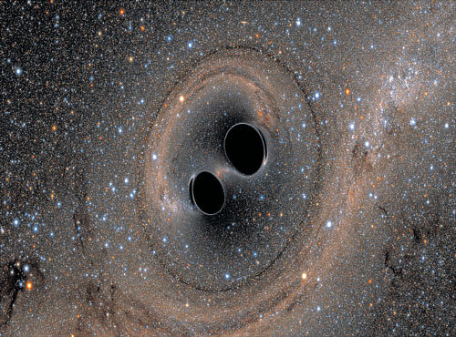 COSMIC FUSION: The collision of two black holes -a tremendously powerful event detected for the first time ever by the Laser Interferometer Gravitational-Wave Observatory, or LIGO-is seen in this still from a computer simulation in Washington February 11, 2016. In a landmark discovery, LIGO spotted gravitational waves-or ripples in space and time hypothesised by Albert Einstein a century ago-generated as the black holes spiralled in towards each other, collided, and merged. SXS VIA LIGO