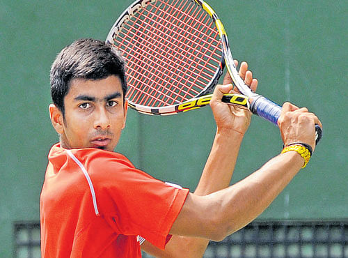 IN THE GROOVE Gujarat's Bharghav Patel during his win over Oges Theyjo of Tamil Nadu on Wednesday. DH PHOTO