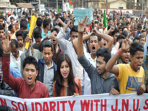 Activists of the Satra Mukti Sangram Samity, Assam the student wing of Krishak Mukti Sangram Samity taking out a procession in solidarity with the agitating JNU students, in Guwahati on Thursday. PTI Photo.