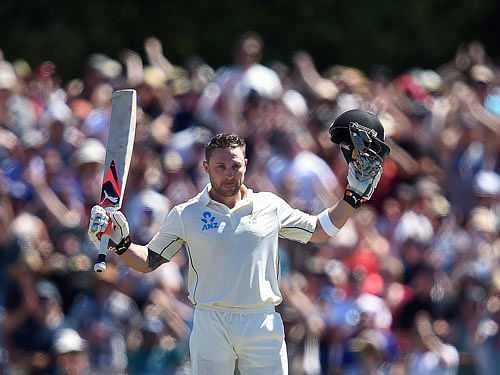 New Zealand captain McCullum celebrates after breaking the world record for the fastest test century during the first day of the second test against Australia in Christchurch, New Zealand.  Reuters photo