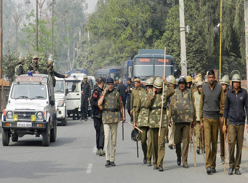 Indian Army & Haryana Police conducting Flag March in the view of violence due to Jat community's agitation for resrvation, in Rohtak on Saturday. PTI Photo