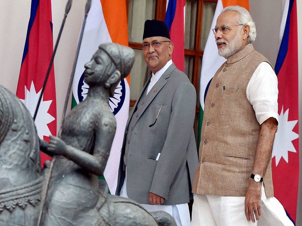 Prime Minister Narendra Modi  and Nepalese counterpart K P Sharma Oli. PTI file photo