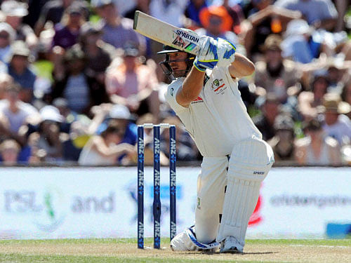 Australia's Joe Burns down on one knee as he bats against New Zealand on the second day of the second International Cricket Test match at Hagley Park Oval, in Christchurch, New Zealand, Sunday. PTI Photo.