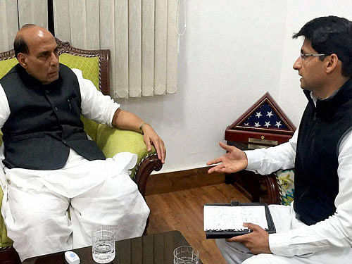 Home Minister Rajnath Singh during a meeting with Congress MP Deepender S Hooda, in New Delhi on Sunday. PTI Photo