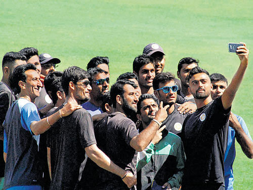 one for the album: Saurashtra players take a selfie during a training session ahead of their Ranji Trophy final against Mumbai at Pune. PTI