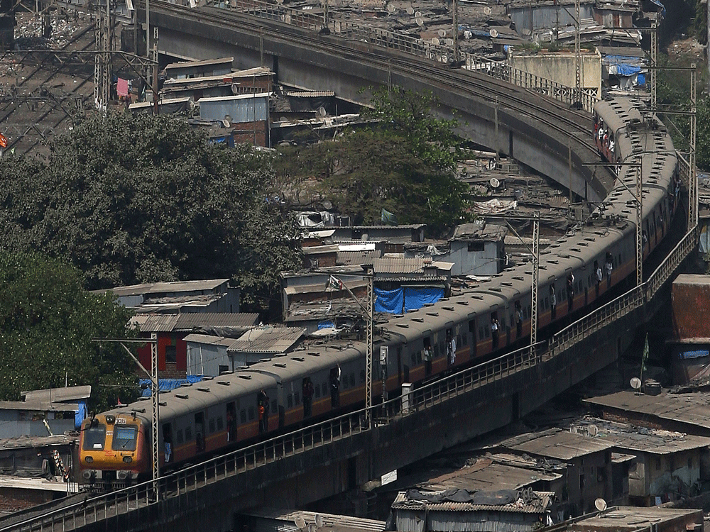 A group of transport activists today highlighted the issue of alarming rise in number of passenger deaths, mostly due to crossing of tracks and falling off crowded trains, and demanded a separate zone for local services in Mumbai to address the woes of commuters. File photo