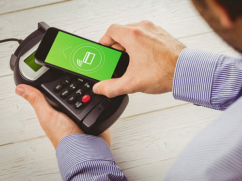 The partnership will enable citizens to do domestic money transfers, credit card, telephone, mobile bill payment service and DTH recharge (in cash) through POS/Card Swipe devices at a network of over one lakh merchants across the country,it said. Image courtesy Twitter.
