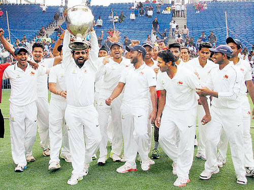 The Mumbai teamcelebrates after their victory in the Ranji Trophy Final in Pune on Friday. PTI