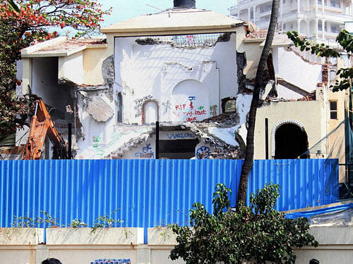 Bollywood legend the late Rajesh Khanna's bungalow, Aashirwad being demolished by its new owner in Mumbai on Saturday. PTI Photo