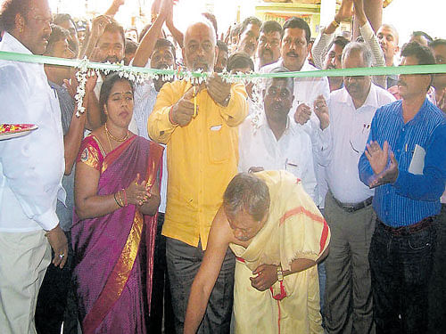 District In-charge Minister A Manju inaugurates Ambedkar Community Hall in Hassan on Sunday. dh photo