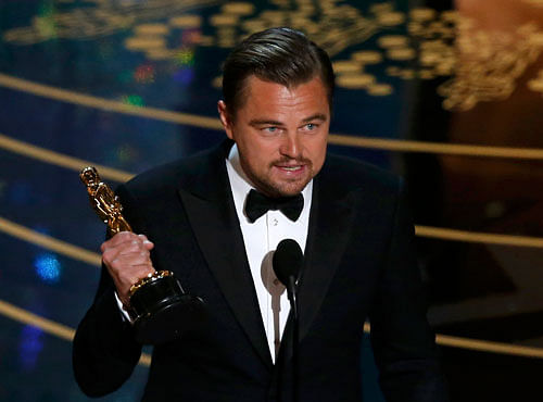 Leonardo DiCaprio holds the Oscar for Best Actor for the movie 'The Revenant' at the 88th Academy Awards in Hollywood. Reuters photo
