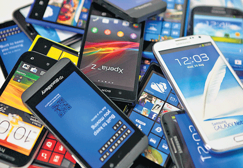 Mobile phones and tablets will become dearer with the government proposing a hike in levies on components like printed circuit boards (PCBs) and peripherals like batteries and chargers. File Photo