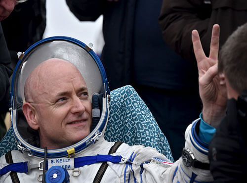 U.S. astronaut Scott Kelly gestures shortly after landing near the town of Dzhezkazgan. Reuters