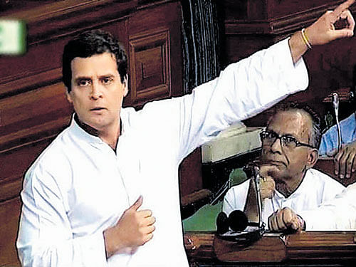 L-R) Congress vice-president Rahul Gandhi speaks in the Lok Sabha in New Delhi on Wednesday. PTI