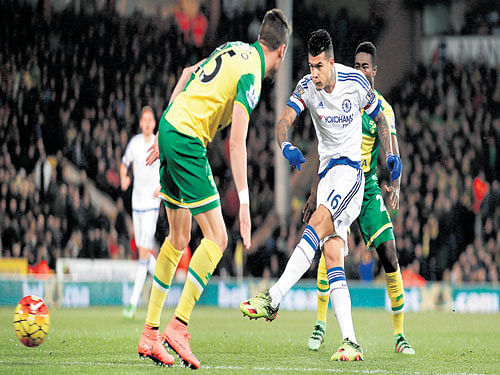 Chelsea's Robert Kenedy (right) scores his team's first goal against Norwich City on Tuesday. Reuters