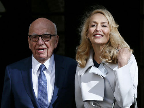 Media mogul Rupert Murdoch and Jerry Hall pose for a photograph in London, Britain March 4, 2016. REUTERS