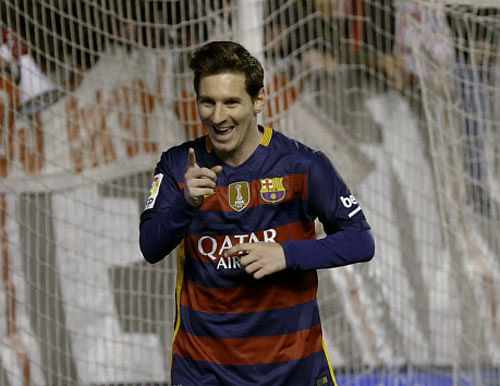 no stopping him: Barcelona's Lionel Messi celebrates after scoring against Rayo Vallecano during their La Liga tie at the Vallecas stadium on Thursday. Reuters