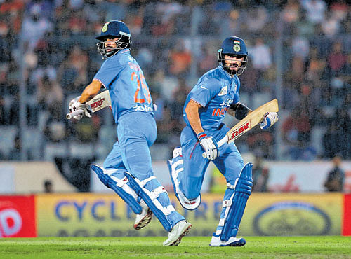 DELHIDABANGS: Virat Kohli (left) and ShikharDhawanwere involved in a 94-run stand that set the base for India's win in the Asia Cup final on Sunday. PTI